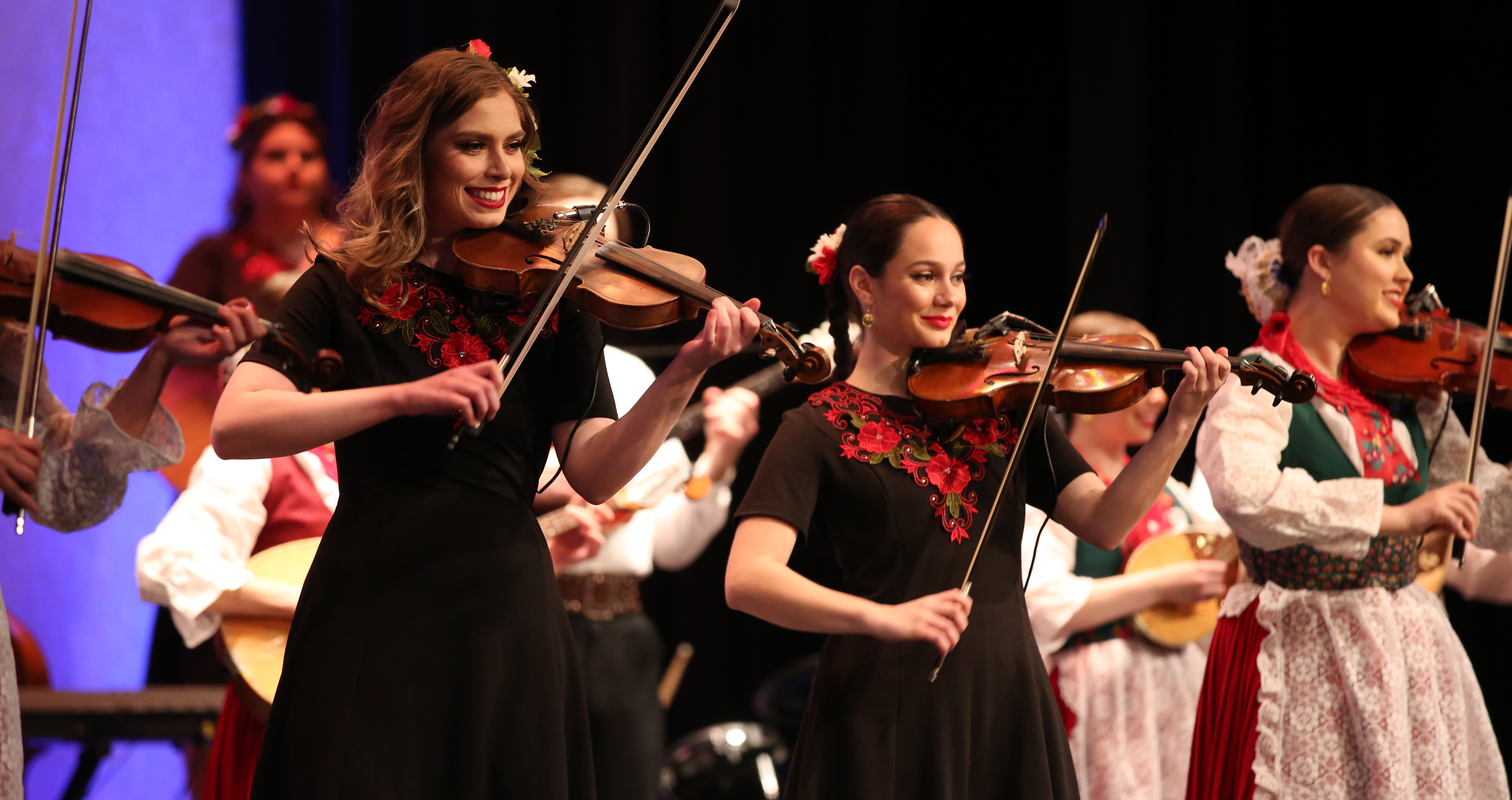 Violinists performing Croatian songs.